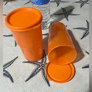 Orange Tupperware tumblers with lids 12oz 350ml. Drinking cups